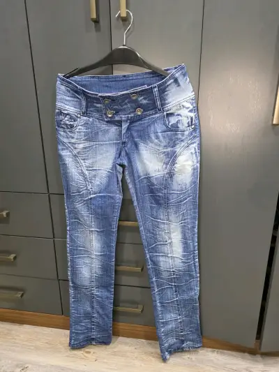 Jeans azul desgastado para mujer - miniatura 1