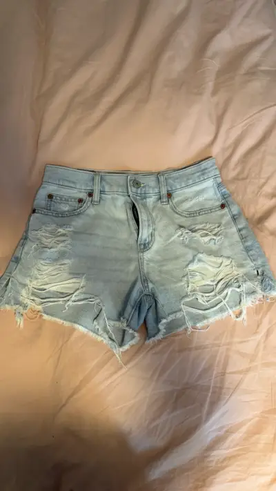 Shorts American eagle de mezclilla desgastados - miniatura 1