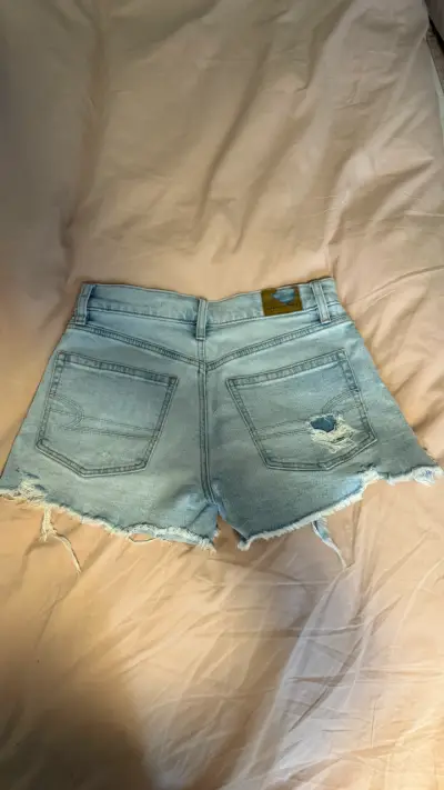 Shorts American eagle de mezclilla desgastados - miniatura 2