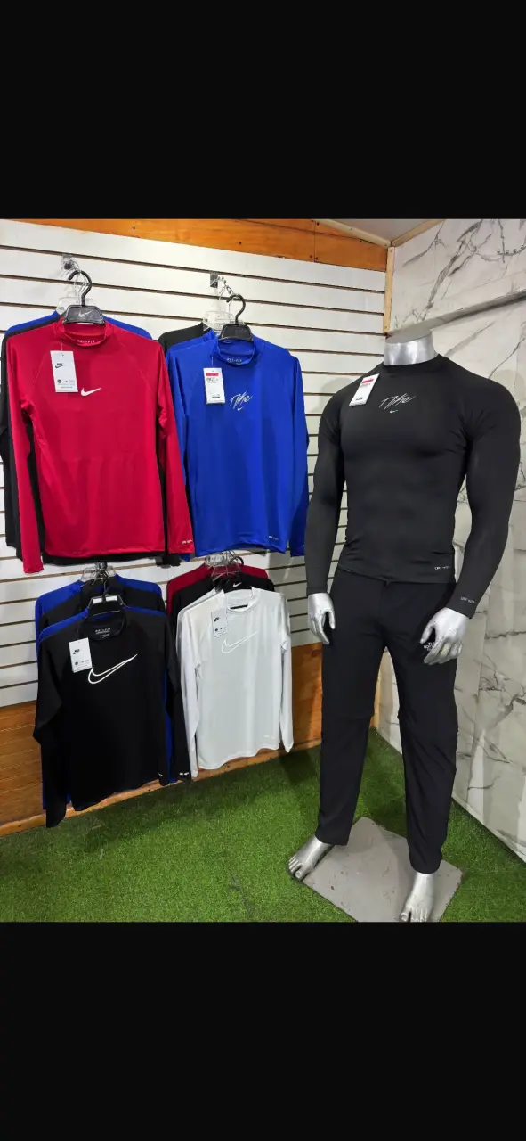 Polera deportiva Nike Dri-FIT manga larga - 1