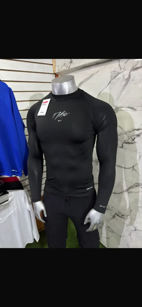 Polera deportiva Nike Dri-FIT manga larga - 2