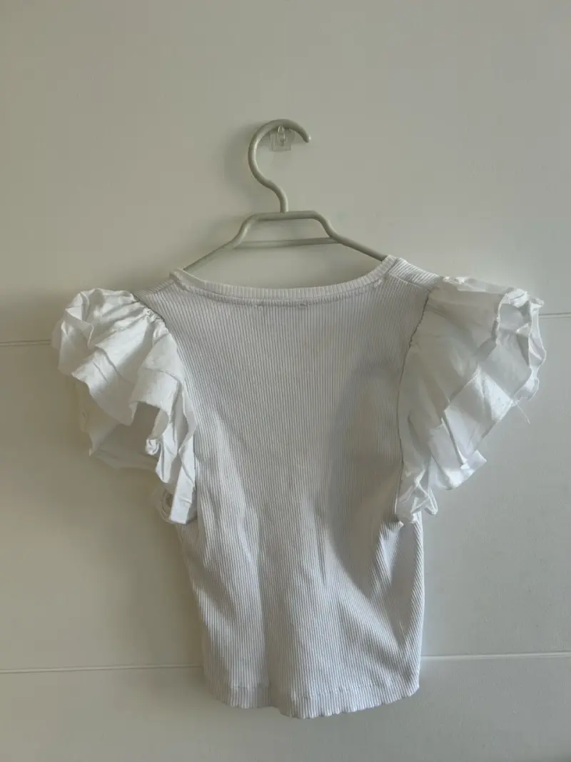 Blusa blanca con mangas abullonadas - 2