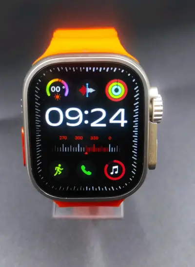 Smartwatch con correa naranja vibrante - miniatura 1