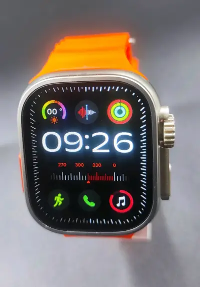 Smartwatch con correa naranja vibrante - miniatura 2