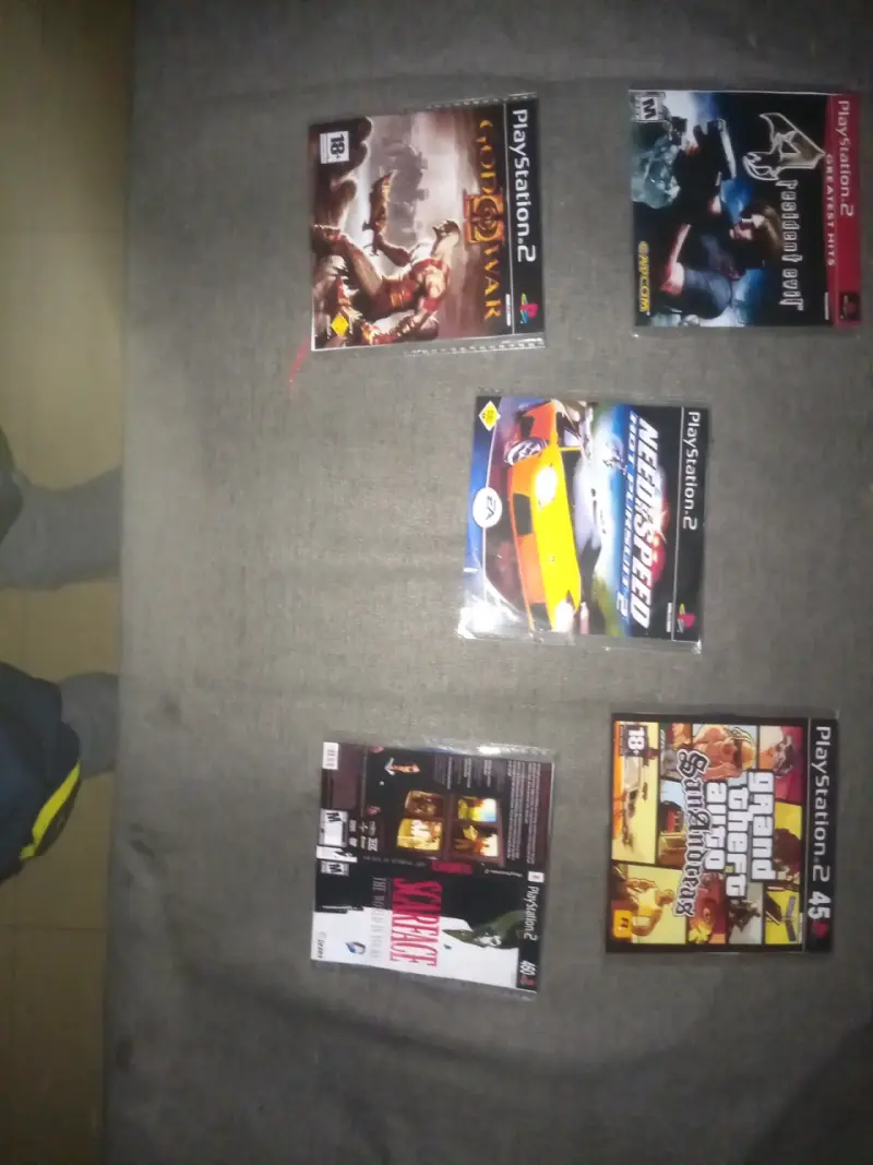 Lote de videojuegos y accesorios para consola - 2