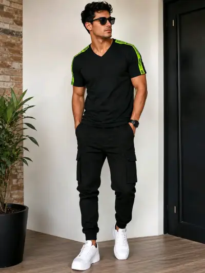 Polera negra con detalles verdes para hombre - miniatura 3
