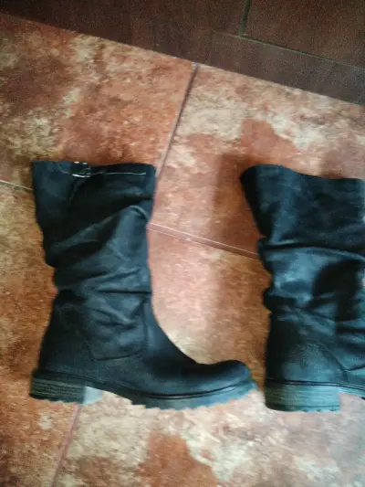 Botas negras de cuero para mujer - miniatura 1