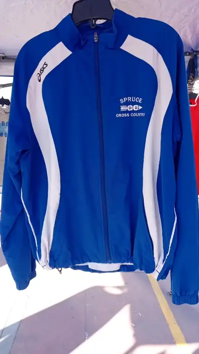 Chaqueta deportiva Asics azul y blanca - miniatura 1