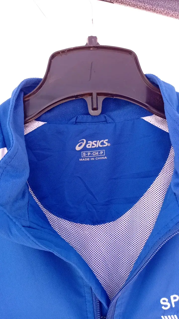 Chaqueta deportiva Asics azul y blanca - 2