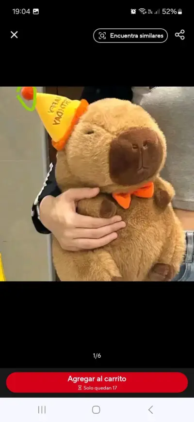 Peluche de capibara con sombrero de fiesta - miniatura 1