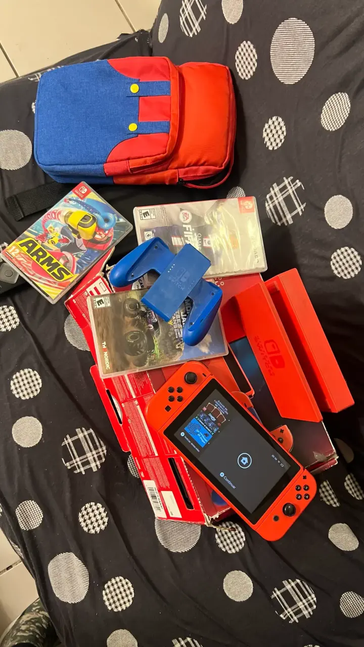 Consola Nintendo Switch con juegos y accesorios - 1