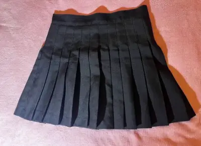 Falda plisada negra elegante - miniatura 1