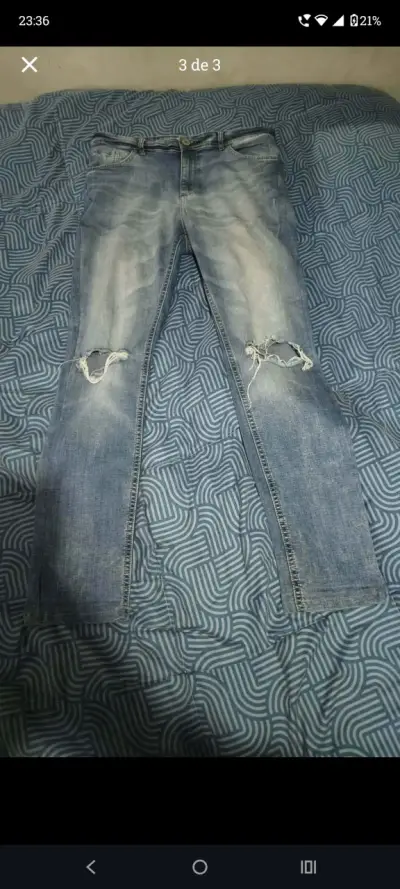 Jeans desgastados azul claro para hombre - miniatura 1