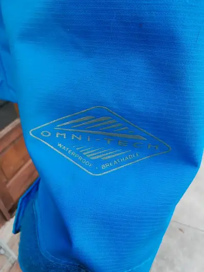 Chaqueta impermeable Columbia azul con capucha - miniatura 2
