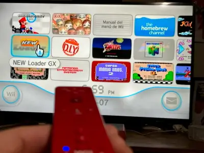 Nintendo Wii Mini con accesorios y juegos - miniatura 4