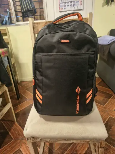 Mochila negra Haibow con detalles naranjas - miniatura 1