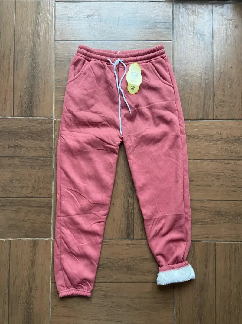 Pantalones de felpa rosados para mujer