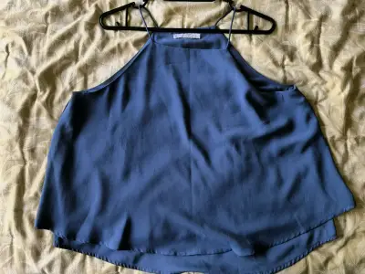 Blusa azul sin mangas de mujer - miniatura 1