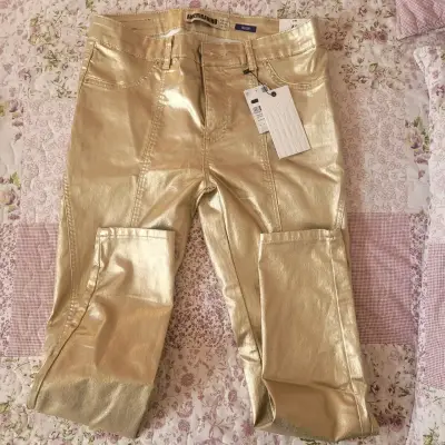 Pantalones dorados metálicos Americanino nuevos - miniatura 1