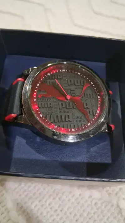 Reloj Puma negro y rojo deportivo - miniatura 1