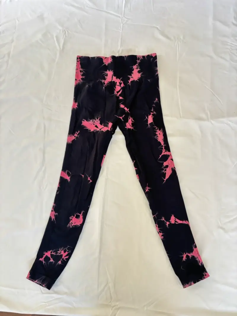 Leggings deportivos estampados negro y rosa