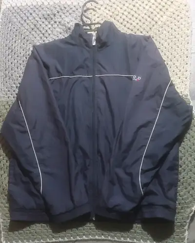 Chaqueta deportiva azul con cierre - miniatura 1