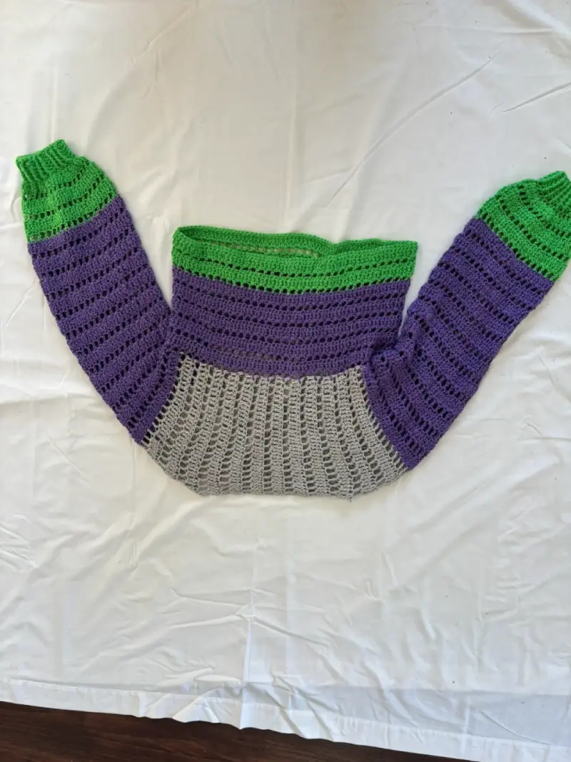Suéter tejido a crochet multicolor