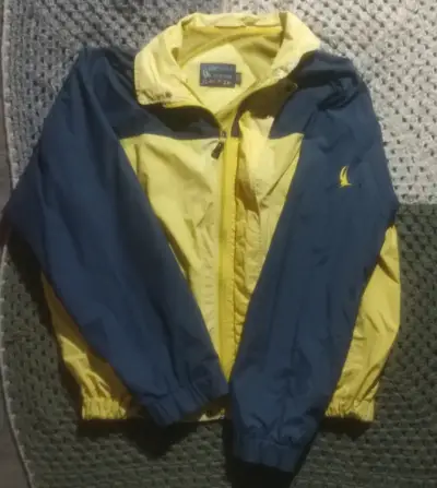 Chaqueta cortaviento bicolor amarillo y azul - miniatura 2