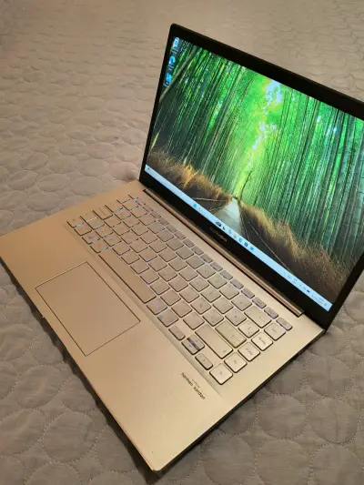 Laptop ASUS VivoBook verde en buen estado - miniatura 6