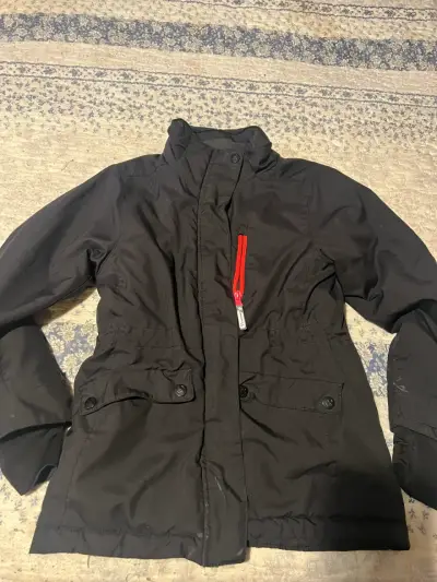 Chaqueta negra con cierre rojo para niña - miniatura 1