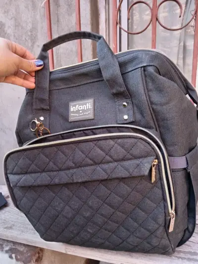 Mochila pañalera Infanti gris acolchada - miniatura 1
