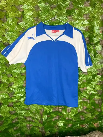 Polera deportiva Puma azul y blanca - miniatura 1