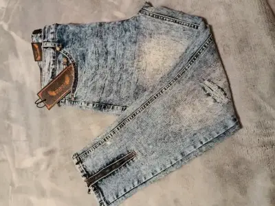 Jeans desgastados azul claro con cierre - miniatura 1
