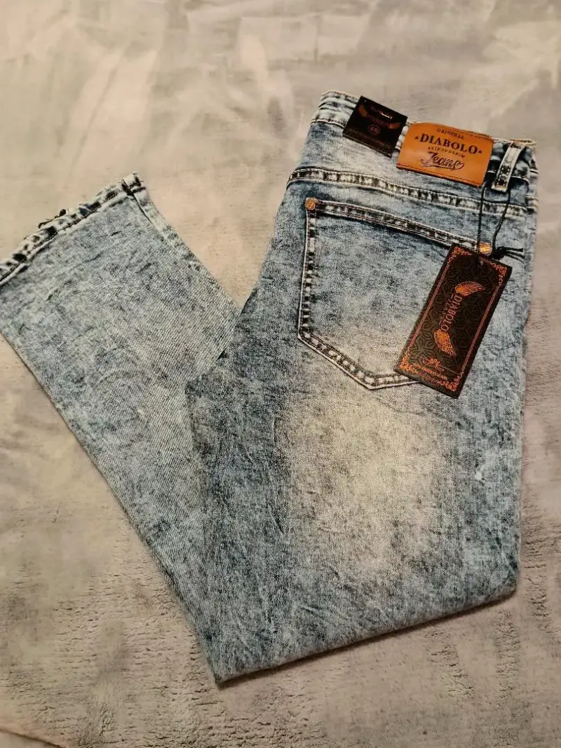 Jeans desgastados azul claro con cierre - 2