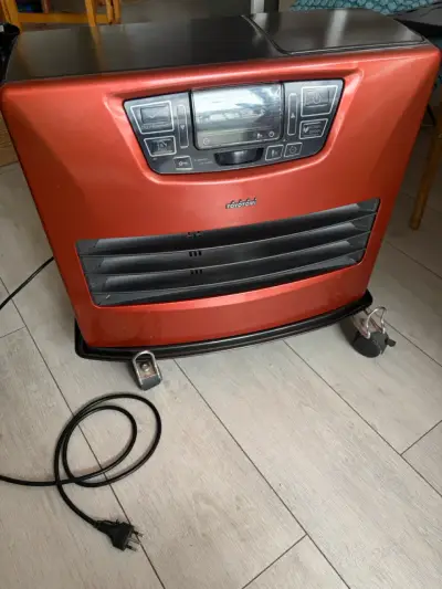 Estufa a parafina Toyotomi con accesorios - miniatura 2