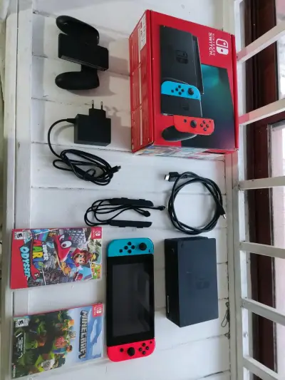 Nintendo Switch V2 con juegos - miniatura 1