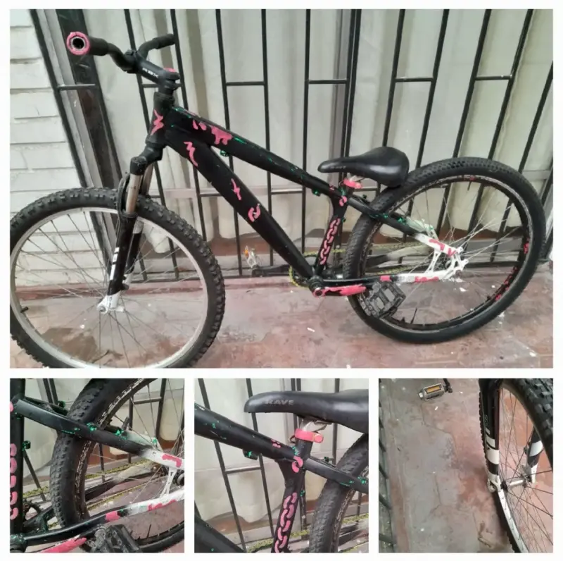 Bicicleta de montaña personalizada negra y rosa