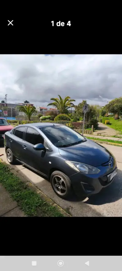Mazda sedán gris en buen estado - miniatura 4