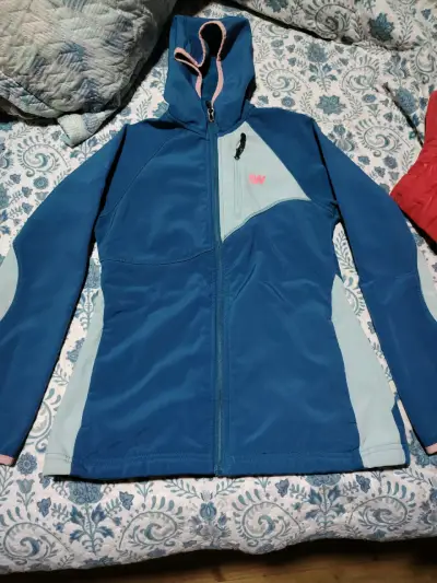 Chaqueta deportiva azul con capucha - miniatura 1