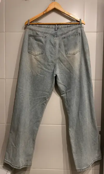 Jeans desgastados de mezclilla azul claro - miniatura 2