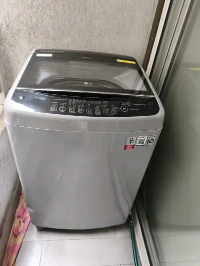 Lavadora LG TurboDrum 13 kg plateada - miniatura 1