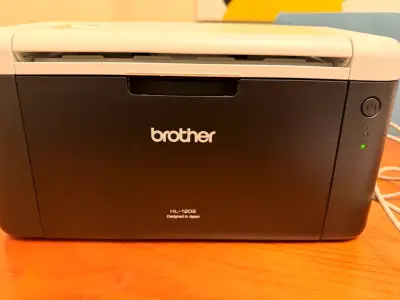 Impresora láser Brother HL-1202 compacta - miniatura 1