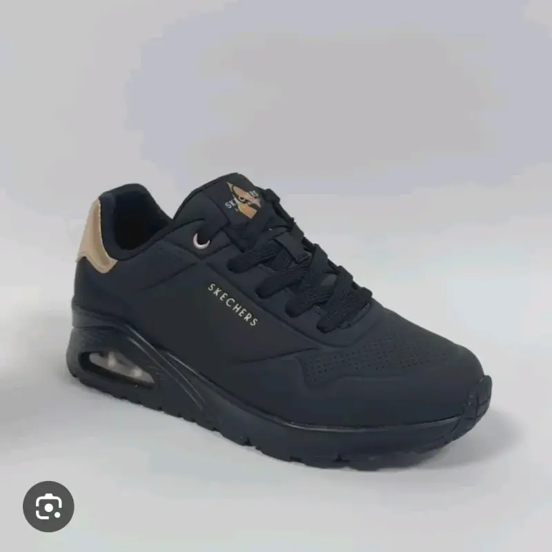 Zapatillas Skechers negras con detalles dorados - 1