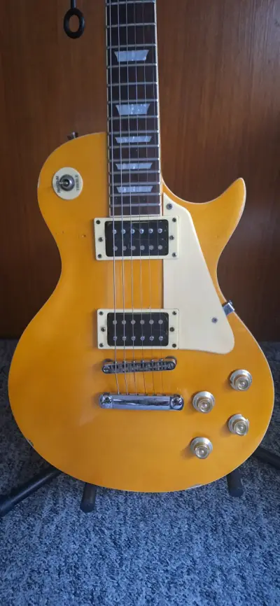 Guitarra eléctrica estilo Les Paul amarilla - miniatura 1