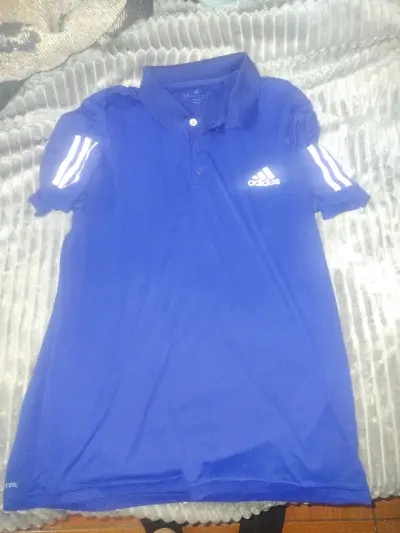 Polera polo Adidas azul con logo - miniatura 1
