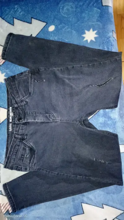 Jeans azul oscuro estilo casual - miniatura 1