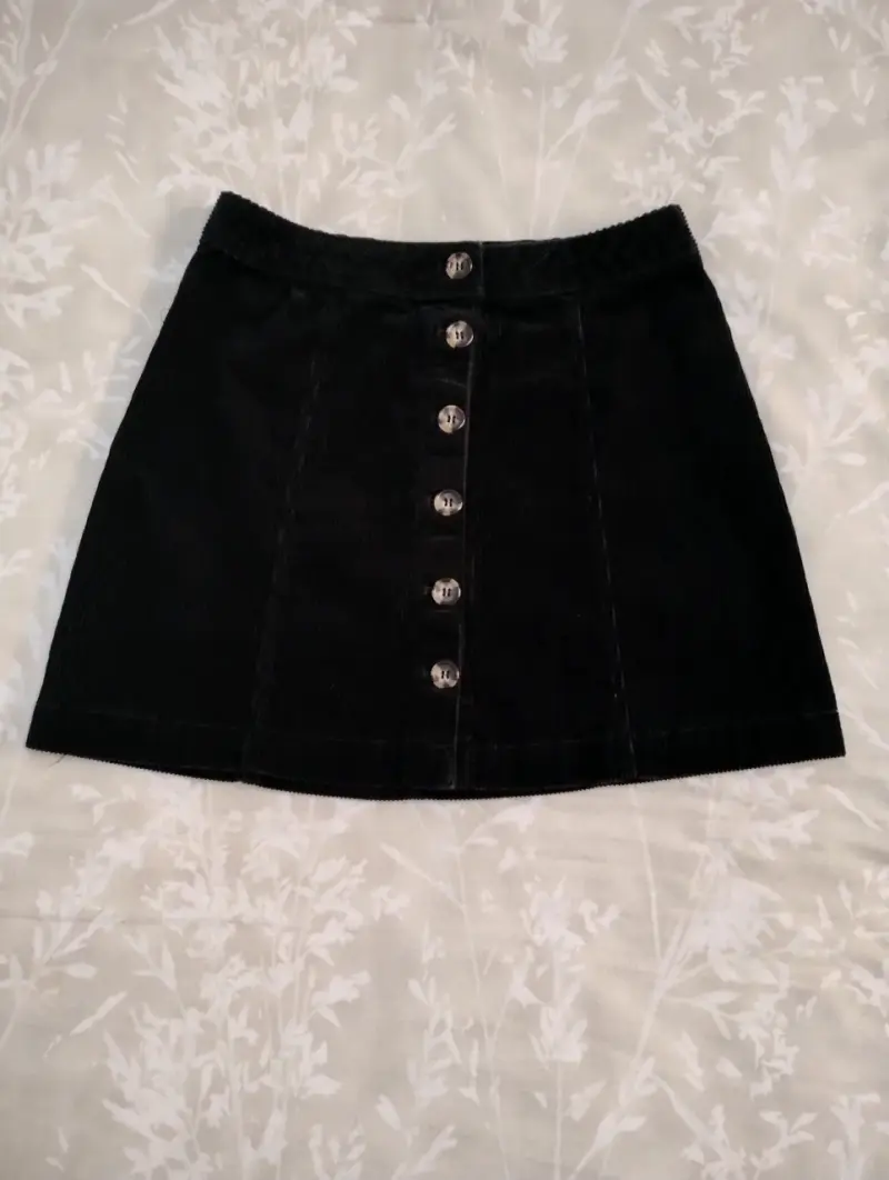 Falda negra cotele con botones - 1