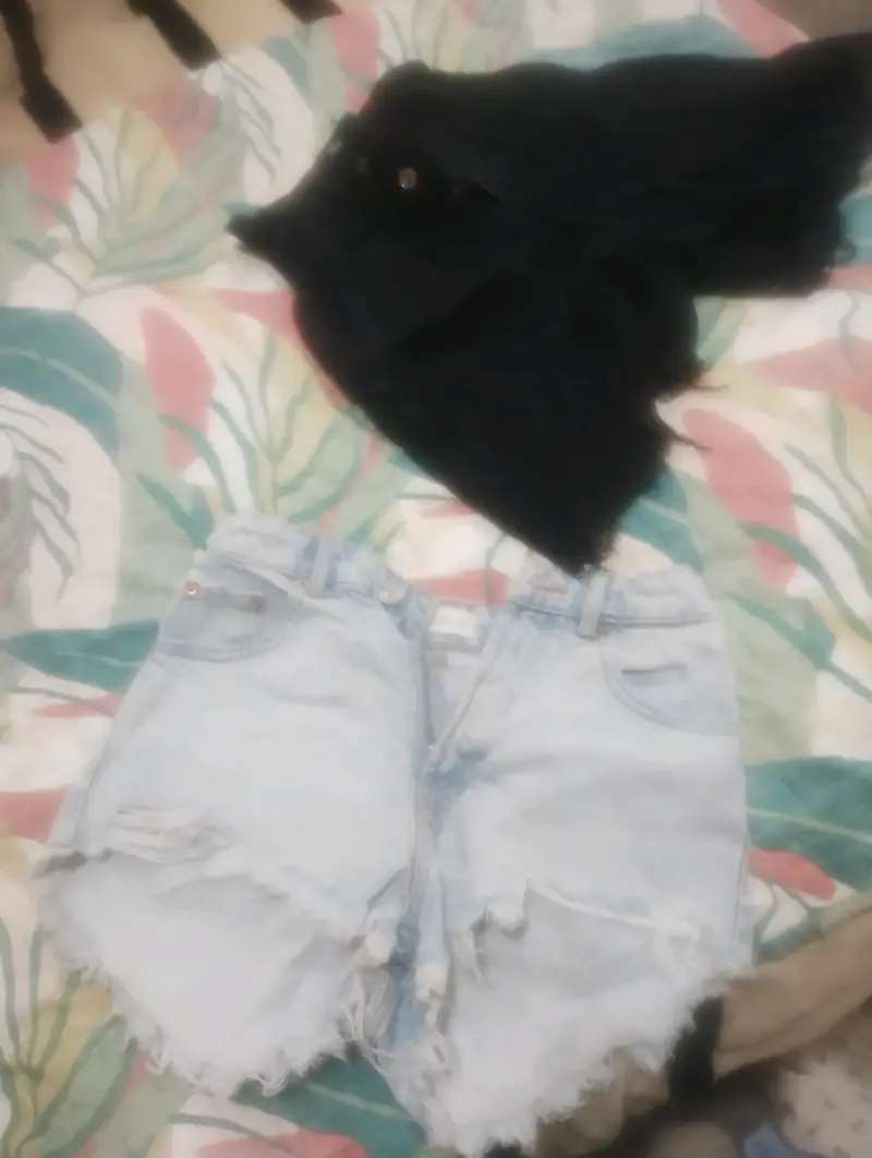 Shorts de mezclilla desgastados para mujer