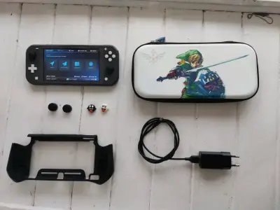 Nintendo switch lite negra con magia - miniatura 1
