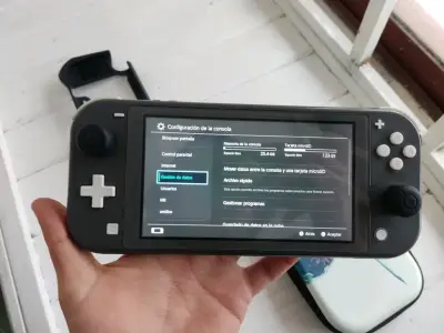 Nintendo switch lite negra con magia - miniatura 2